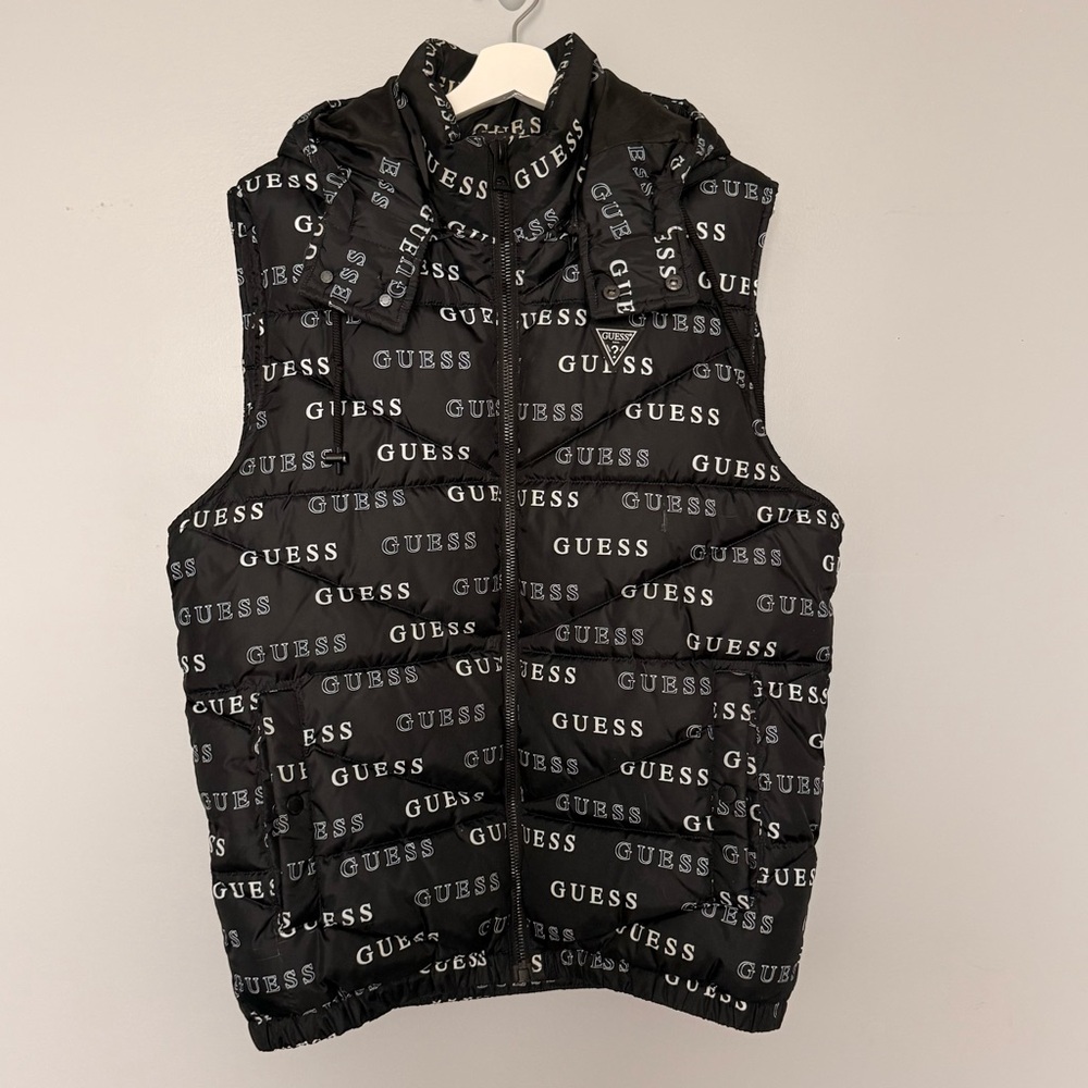 Guess black puffer vest featuring an all-over white logo print with hoodie sz M